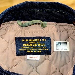 Military field jacket in forest